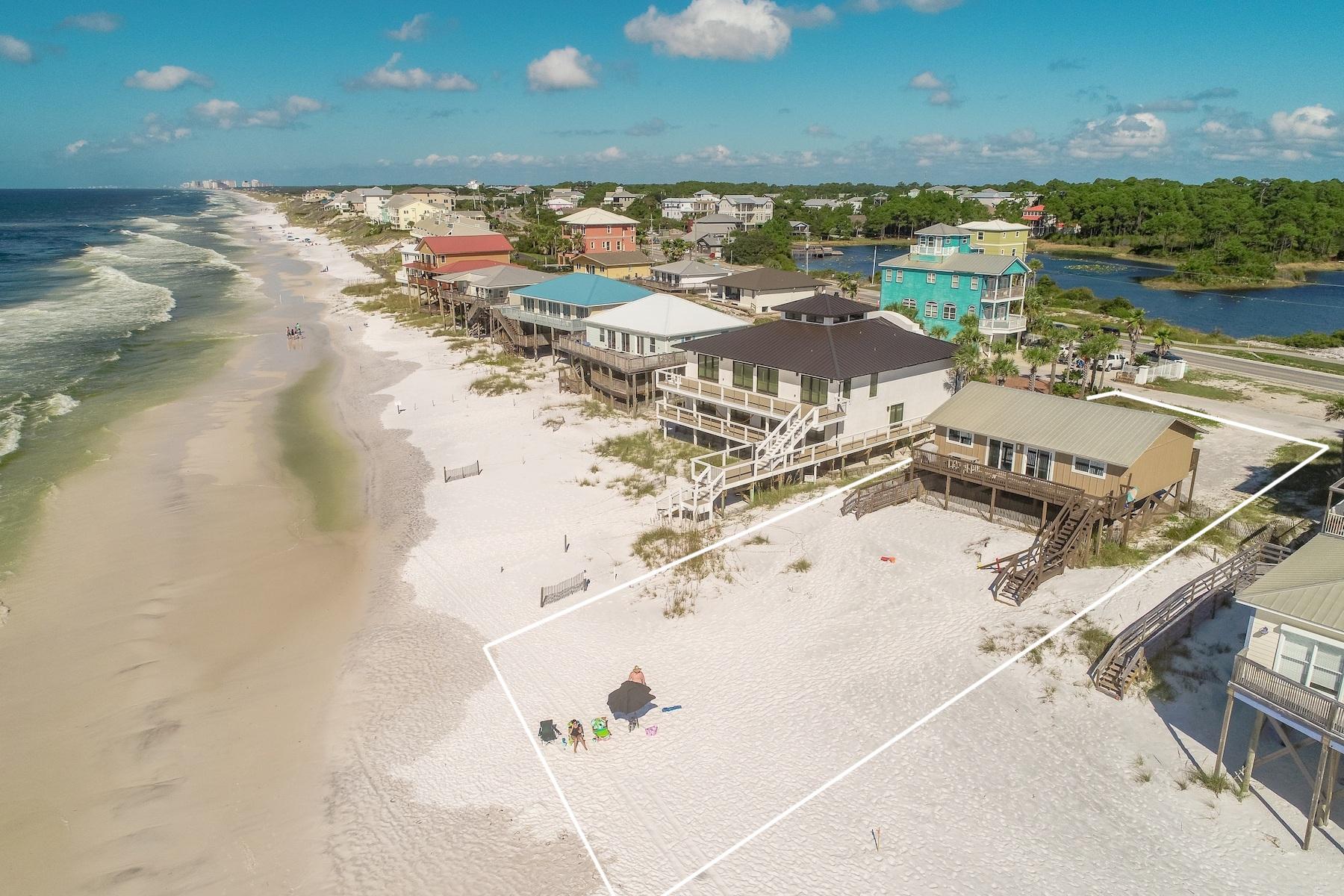 Extraordinary gulf views are well defined from this old Florida style beach retreat prominently situated on the largest homesite off Fort Panic, south of Scenic Highway 30A offering 75' of pristine beach frontage. This property is currently an impressive income producing home with consistent historic short term rental performance derived by a functional open living floorpan juxtaposed premium gulf front positioning. This property conveys with ready-to-go DEP approved building plans (pending full approval from Walton County building department, which is currently in progress) allowing for a rare redevelopment opportunity to maximize value in this premium location. Fort Panic is located on the West end of 30A close to world class restaurants, shopping, premier golf courses and local