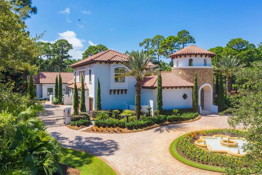 Elegance and privacy exude from this architecturally significant gated estate, complete with lake-front views of the prestigious Raven Golf Course. A worldly vernacular creates a breathtaking design and beautifully curated spaces, ideal for elevated living and formal gatherings. A sense of arrival flows throughout the home, from the soaring tower entryway, manicured courtyard and vaulted beamed ceilings in the foyer. Breathtaking renovation work was completed by renowned Scottsdale based designer Christopher K Coffin, adding tasteful modernity to this extraordinary home. Timeless luxury is found around every corner, from wide plank walnut flooring and Italian marble countertops in the kitchen and butler's pantry, to the 'his and hers'' vanities in the master suite.