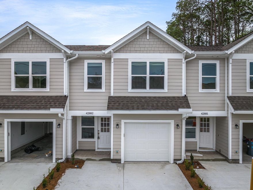 DO NOT MISS YOUR CHANCE to get into a BRAND NEW townhome in the heart of BLUEWATER BAY! Upgrades including QUATRZ countertops, STAINLESS STEEL appliances, White SHAKER cabinets throughout and VAULTED ceilings in the master. SUBWAY tile backsplash and master SHOWER. Plenty of storage with an oversized WALK IN master closet and a one car GARAGE. The main floor will be LVP with carpet on the stairs and upstairs. Call your favorite agent today!