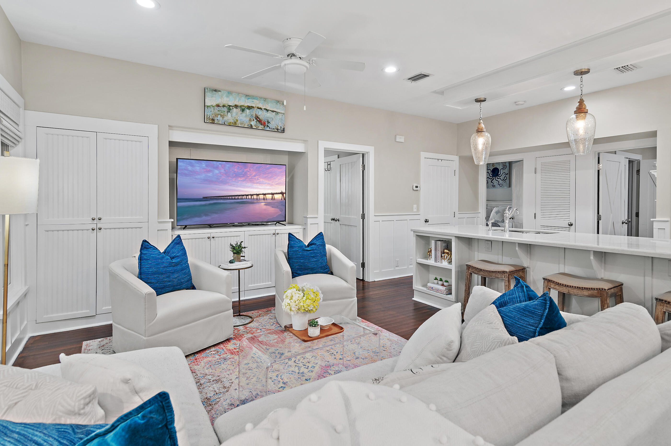 Welcome to 18 Olivia in (oh so close to the beach) Magnolia Cottages by the Sea community. This coastal home is on the desirable east end of 30A with an inviting open floorplan and remodeled kitchen. The large quartz island is complemented by GE Cafe line appliances. The freshly painted woodwork in the living room and kitchen gives an airy ambiance, creating the ideal backdrop for coastal living. This home has three bedrooms and three full bathrooms, a seperate laundry room and an expansive screened in patio with a vaulted ceiling, swinging bed, television and ceiling fan. Plantation shutters and custom woven shades adorn the oversized windows. Outside, a secret paved garden path leading to the street adds a touch of enchantment. Other features: outdoor shower and outdoor shed