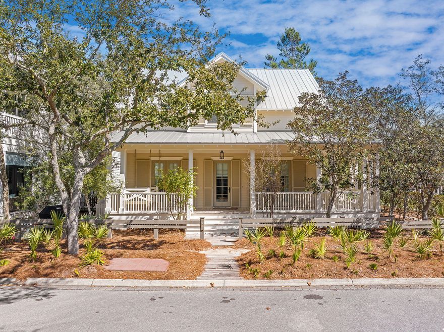 Located in the sought-after Lake District of WaterColor, this recently remodeled 5-bedroom, 4.5-bath home blends modern updates with effortless coastal charm. Situated on a spacious corner lot, it's just a short stroll to the Frog Pool, Sand Hill Circle park, Camp WaterColor, and the scenic footbridge leading to the Town Center. With a newly painted exterior and a brand-new private pool and spa, this home is designed for seamless indoor-outdoor living.Inside, the open layout is bright and inviting, with fresh finishes and a coastal feel throughout. The spacious living area is warmed by wood floors and natural light, while the chef-inspired kitchen is equipped with high-end appliances, a large center island, and custom cabinetry, making it perfect for hosting friends and family. The first-floor primary suite highlights coastal living with shiplap accents and barn doors leading to the closet. Upstairs, you'll find four additional bedrooms, including a built-in bunk room, all thoughtfully designed for comfort and convenience.

Above the garage, the carriage house creates additional living space with a bedroom and bathroom, perfect for guests. A covered walkway connects the carriage house to the main house, providing privacy and ease of access.

Step outside to enjoy the oversized screened porch, perfect for morning coffee or outdoor dining, or relax on the expansive wraparound porch and take in the laid-back atmosphere of WaterColor. The brand-new private pool and spa are a great addition, creating a serene space to unwind after a day of biking, beaching, or exploring 30A.

With access to WaterColor's world-class amenitiesincluding the Beach Club, multiple resort-style pools, nature trails, and the lazy river at Camp WaterColorthis home is a rare opportunity to embrace the best of the 30A lifestyle, where every day feels like a vacation.