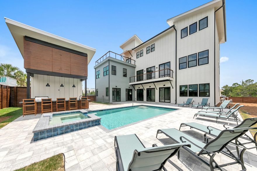 Set in the heart of Blue Mountain Beach along Scenic 30A, this exceptional 9-bedroom, 11-bath coastal estate offers over 6,000+ square feet of thoughtfully designed luxury living. Spanning three expansive levels, the home is built for both elevated entertaining and relaxed coastal living, highlighted by a stunning rooftop deck with sweeping Gulf views. Outdoors, enjoy a private resort-style pool, spa, and summer kitchen designed for entertaining after sunny days at the beach. Just moments from beach access, dining, and the natural beauty that defines 30A, this recently constructed residence presents a rare opportunity to own a premier investment property in one of the Gulf Coast's most sought-after destinations on the beautiful Emerald Coast. Beyond its immediate lifestyle appeal, this property represents a compelling opportunity in a market defined by limited inventory, strong demand, and long-term appreciation. Large-scale, high-quality homes in this location are increasingly rare, especially those offering this level of design, capacity, and proximity to the Gulf.

Whether you are seeking a legacy beach home, a high-performing rental asset, or a hybrid of both, 56 Rolling Dunes delivers on all fronts--combining scale, location, and lifestyle into one standout offering along the Emerald Coast.