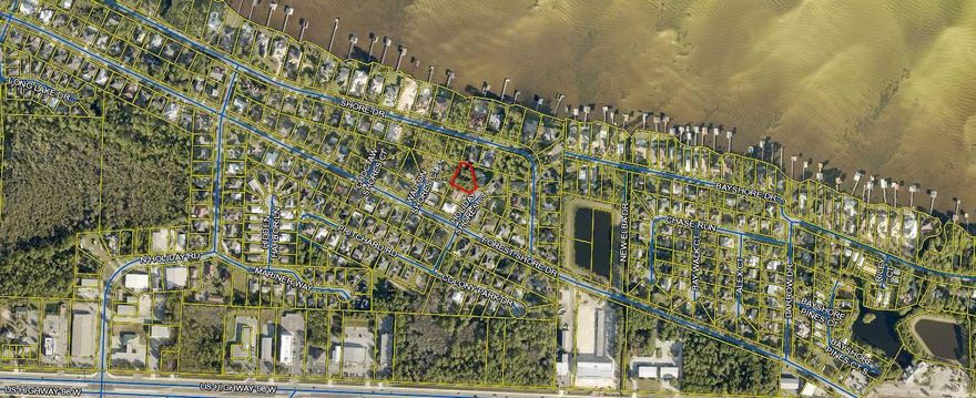 This beautiful lot with potential for Bay views makes it a perfect homesite for full time residents or second homeowners. Perfectly located near the shores of the Choctawhatchee Bay, the cul de sac is perfect for families, while still being close to shopping, golf courses, restaurants, and everything Sandestin and Destin have to offer. Golf cart to the beach or the Seascape Town Centre! High and dry lot located in an X flood zone. There are no HOA fees and the tap fees are due. Buyer to perform their own due diligence. Survey is available.