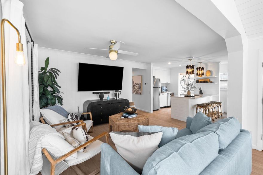 Back on the market at not fault to the seller. Welcome to Gulf Blue Resort, nestled in the heart of Blue Mountain Beach, where coastal charm meets luxury living. This solid concrete beach home boasts high-end furnishings and professional designer finishes and decor, elevating the open-concept space to new heights of sophistication. The fully equipped kitchen is a culinary enthusiast's dream, featuring gorgeous quartz countertops, stainless steel appliances and a breakfast bar for casual dining. Entertain with ease in the expansive dining room, adorned with a vaulted shiplap ceiling, or venture outdoors to the inviting dining and lounge/living areas, complete with charming string lights, perfect for unwinding after a day at the beach.