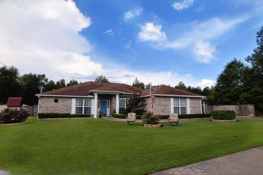 This 4bed/2bath home sits on over a spacious, half acre, cul-de-sac lot in quiet Baker neighborhood. This home is perfect for the family that enjoys time together, both indoors and out! The home is all brick and is extremely inviting with, lush green lawns and beautiful landscaping. Upon entering, you'll find hardwood floors leading to a comfortable family room, with fireplace, that connects with both the kitchen and tiled Florida room. The 4th bedroom is off of the entrance and is currently being used as an office. With the home's split floor plan the kitchen and family room truly become the heart of this home. The kitchen has silestone counter-tops, plenty of cabinet-storage, updated fixtures, tiled back-splash, breakfast bar, large