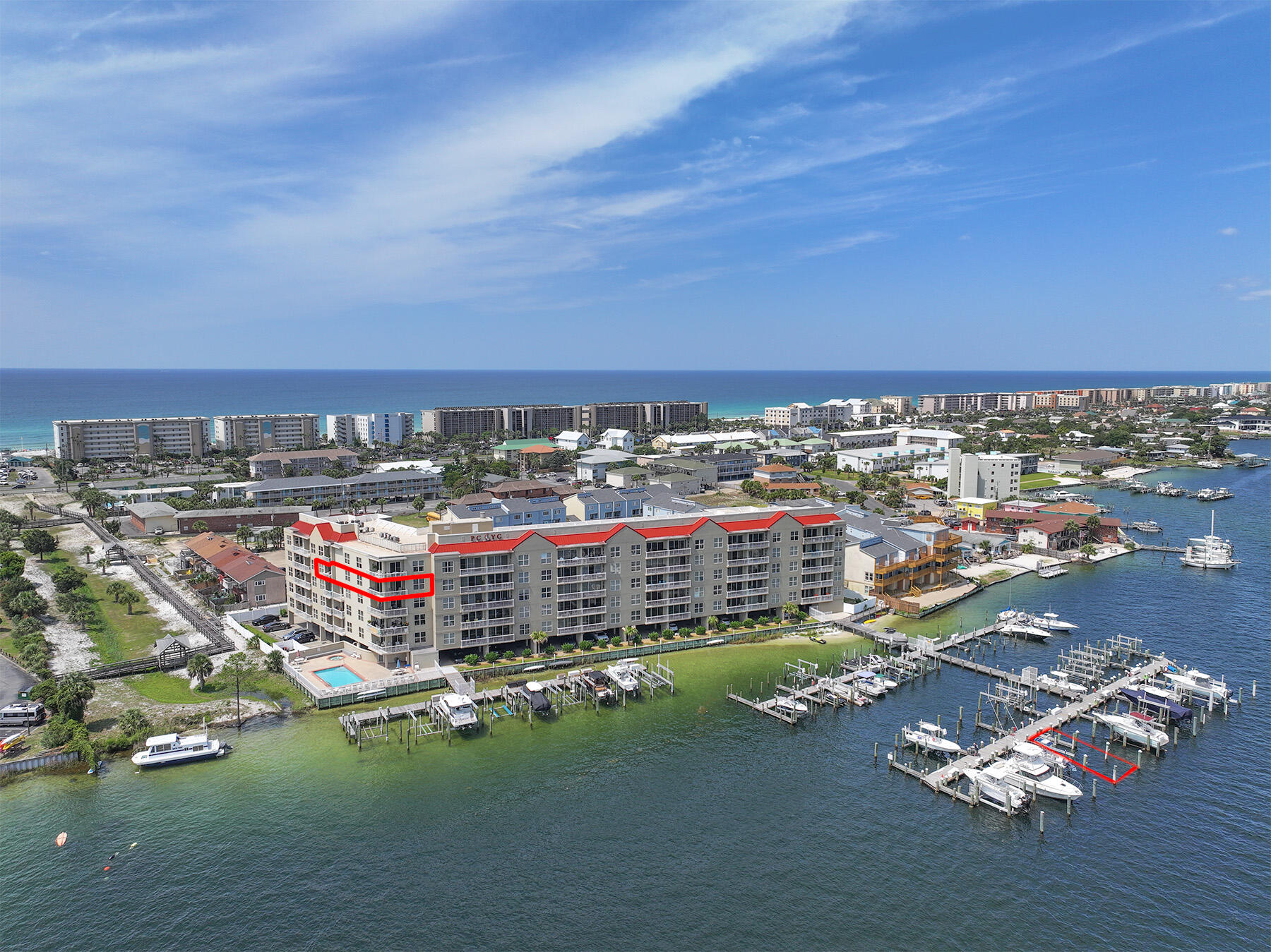 Welcome to spectacular water views from every room in this recently renovated over 2,100 square foot waterfront condo with the only unit in the building offering a gas range, gas fireplace, and grill connection on the wrap around balcony. The spacious open floor plan is perfect for relaxing and entertaining. Three massive bedrooms to stretch out in and all three have the convenience of a full ensuite. The large master bedroom has a private balcony, custom closets, and the shower is a must see measuring in at 7x7. 9 foot custom finished ceilings throughout with over 5 inch crown molding, 5 inch baseboards, and new solid-core doors in oversized frames. Two of everything for entertaining: Two balconies, two ovens, two garbage disposals, two sinks in the kitchen wrapped in Cambria quartz countertops, and two reserved parking spaces within a secure gated area. Delightful and sizable dining and living rooms that are only outdone by the sunsets and water views.
The home has been meticulously maintained and updated throughout to include the modern amenities that buyers expect in a high-end property. Boardwalk access to pristine beaches of the Gulf, plus the building features a sound side heated pool and hot tub as well as personal storage lockers. Deeded deep water boat slip measuring 43 feet long is a boaters and beach goers paradise with Crab Island and the Gulf only minutes away. Pets are welcome with some exceptions. Schedule your showing today!