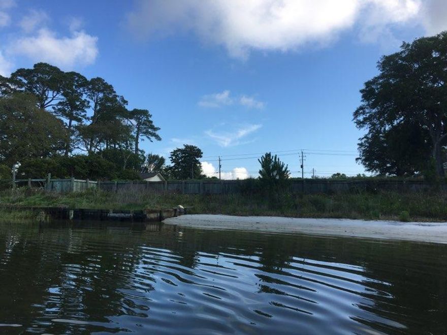 140 feet of WATERFRONT Build a Home or Business or Multi family on this cleared one acre lot. Environmentals have been completed. Hurry this wont last! Qwn your own beautiful beach!