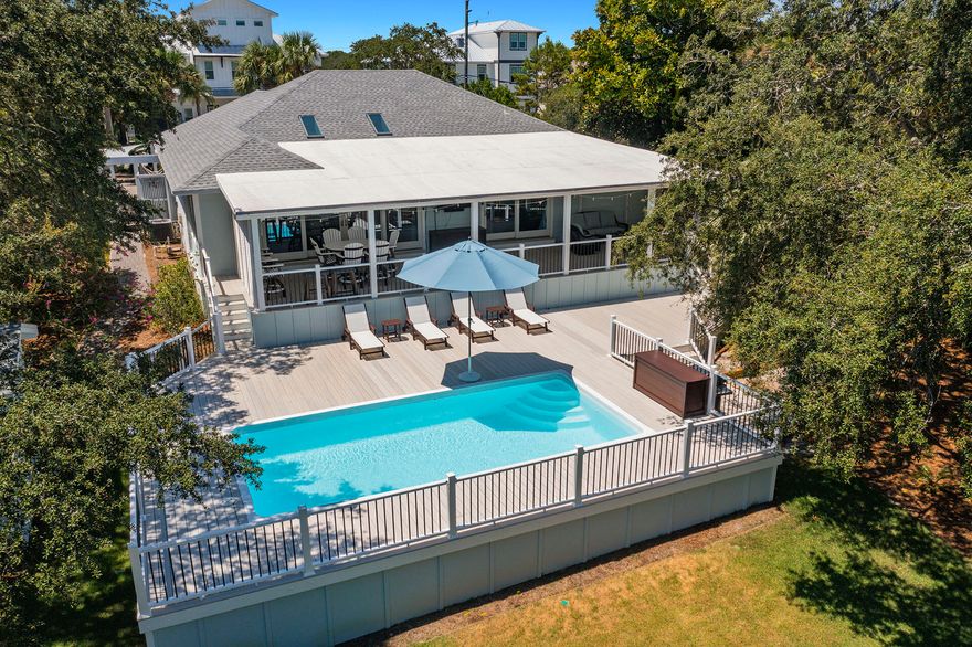 Discover unparalleled elegance and comfort in this stunning lakeside retreat nestled in the coveted Gulf Pines community of Miramar Beach, Florida. This beach house masterfully combines spacious living, modern amenities, and breathtaking water views to create the ultimate vacation experience.This residence is ideal for family gatherings or groups seeking privacy without sacrificing style. The expansive layout offers multiple king and queen suites, a cozy bunk room, and additional sleeper sofa accommodations a" each thoughtfully appointed for rest and relaxation.Step outside to your private oasis featuring a sparkling pool and direct lakefront access via your own private dock. Whether unwinding by the water, casting a line for a peaceful afternoon of fishing, or entertaining guests poolside, every moment here is infused with tranquility and luxury.

Culinary enthusiasts will delight in the fully equipped gourmet kitchen and outdoor grill area, perfect for preparing fresh meals to be enjoyed al fresco on the spacious deck overlooking the serene lake.

For added convenience and adventure, explore the scenic neighborhood on one of four complimentary bikes or a golf cart included with your stay. Just a short five-minute walk leads you to exclusive private beach access, where soft sands and the shimmering Gulf waters await.

Additional touches such as seasonal beach chairs provide effortless comfort for your seaside excursions, ensuring every aspect of your stay is meticulously crafted.

Escape to this lakeside sanctuary, where every detail is designed to refresh the spirit and create lasting memories. Experience the perfect blend of nature's beauty and refined living  your exquisite getaway awaits!
