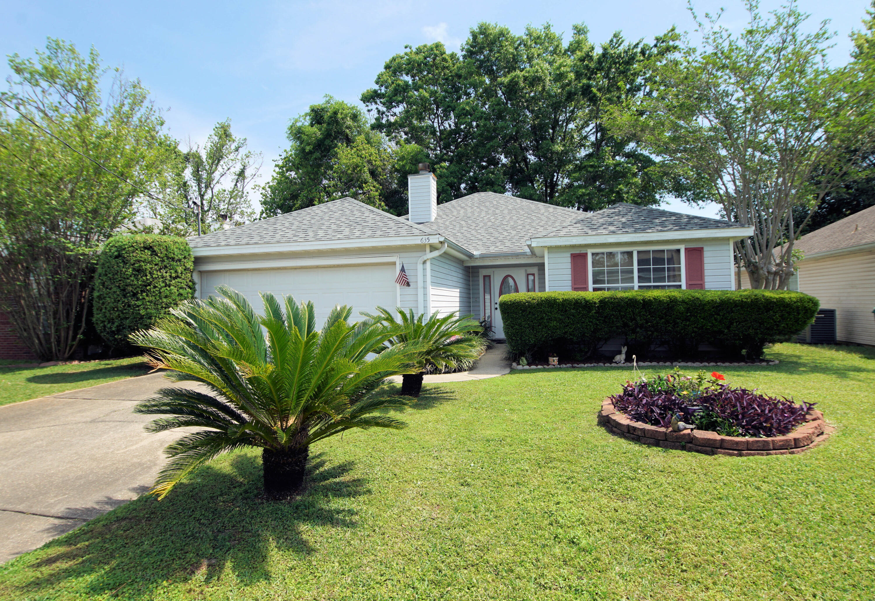 Immaculate curb appeal! Home has a terrific layout with vaulted ceilings in the living room with a wood burning fireplace,12X7 music room, spacious master bedroom that boasts a trayed ceiling, and a walk-in closet. The MBR is perfectly located on the opposite side of the house away from the other bedrooms. Ceiling fans are placed throughout. Roof and AC have been recently replaced.