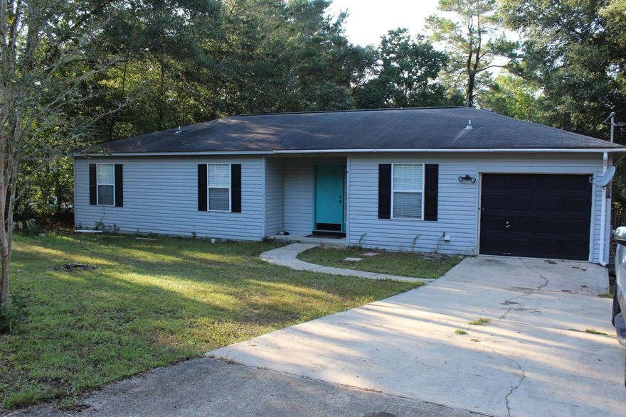 Quaint 3 bedroom, 2 bath home conveniently located near Eglin AFB! This adorable home features three generous size bedrooms, two completely updated bathrooms with wood looking tile floors, updated vanities and sinks, and new fixtures, a large laundry room, plantation shutters, and an additional storage area off the garage. Outside, enjoy your evenings on a large screened-in porch overlooking natural greenery and a large back yard. Call your agent today to schedule a showing!
