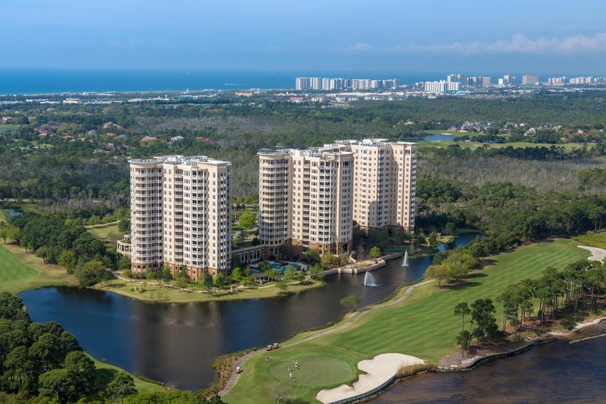 Luxury in the sky! Savor a stunning bird's eye view of the beauty of the Emerald Coast from this gorgeous One Water Place penthouse. Its desirable Castleton floorplan, featuring 3 bedrooms plus a large home office and wrap-around balcony, is enhanced by the 12' ceilings and greater privacy afforded by its top-floor location. The residence is excellently situated to enjoy views of the Gulf of Mexico, Choctawhatchee Bay, Fred Couples Signature Golf Course, and the abundant natural preserve land in Kelly Plantation.As befits the amazing natural setting, the interior exhibits artistic flair and grandeur, combined with attention to quality and convenience. The floors are 18x18'' Turkish Marfil polished marble. Custom carved marble fireplaces provide a focal point in the living room and...