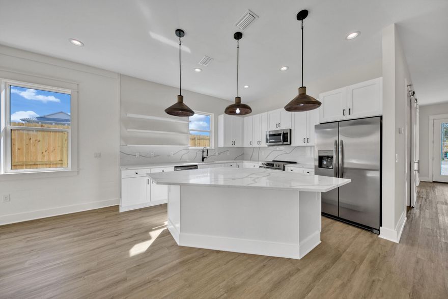 LUXURY New Construction Beach House just blocks from the beautiful Beaches of the Emerald Coast.  Exquisite detail on the finishes throughout give this 8 bedroom 8 bath property the perfect spot for vacation renters to come enjoy life in luxury at the beach.   You'll find grand open spaces, with shiplap walls throughout, Luxury Vinyl Plank flooring, Quartz countertops, tiled showers, and the high end fixtures you should expect in a beach house of this caliber.  Add to this the Custom Pool and  Spa and an oversized Lot with plenty of room for Entertaining and you have one of the best Rental Property Investments in Crystal Beach.  Just steps away from the beach but also steps away from Dining and Shopping.  With Projections Ranging from 240-250K yearly this will be your next RENTAL ENGINE!