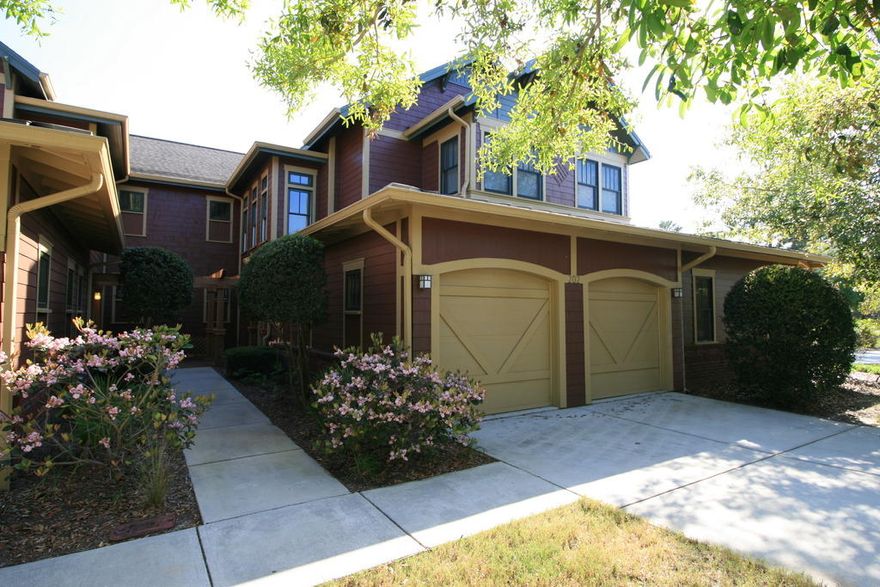 Well Maintained and very large unit with quality Arts and Craft design and finishes. This is one of only two units that have elevator. Home has been newly painted and is in excellent move-in condition Located in Natural setting with abundant wildlife and nature trails. Safe and affordable area that is quiet and efficient. Each building houses 4 units with 6 low-rise buildings total. On the desirable west end of PCB. 10' ceilings throughout with crown moldings and beautiful woodwork. All the amenities are well maintained and patrolled for safety. Lake Powell access for fishing and watching the sunsets. Golf memberships available at Shark's Tooth Private Golf Club. Everything you would expect to see in Wild Heron, a coastal sanctuary.