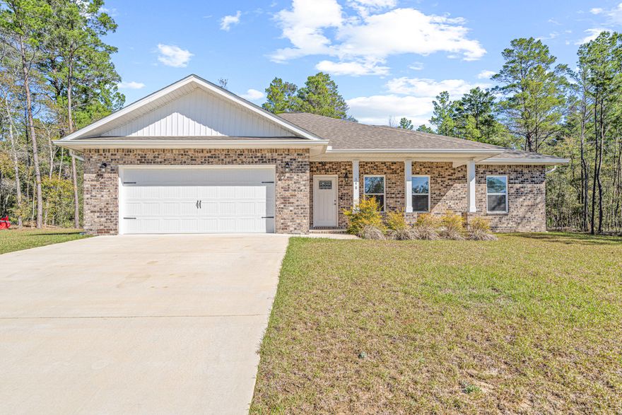 *5.99% VA ASSUMABLE LOAN!* Sellers currently pay $2,170.37/ month for their total mortgage payment! This charming & practically brand new 2023-built craftsman style home is perfectly designed for comfort & convenience. It's nestled on a generous 1.03 acre lot in the serene subdivision of WILDWOOD LAKES, providing a peaceful, natural setting while still being close to local amenities. This home offers modern living with 3 spaciously sized bedrooms and 2 full bathrooms. Spanning 1,622 square feet, the home features an open, flowing layout ideal for both everyday living and entertaining. Additional highlights include fully bricked exterior siding, vinyl flooring throughout every room, granite countertops & white cabinets in the kitchen and both bathrooms, kitchen pantry, ceiling fans in all rooms, separate laundry room, large covered back porch, 2-car garage for ample storage and parking, and a well-maintained exterior that complements the home's style. Recently added updates include blinds on all windows, gutters around the entire home, black chain linked fencing, and grey epoxied flooring in the garage. Whether you're relaxing indoors or enjoying the expansive outdoor space, this home offers the best of both worlds! Sellers have a transferable termite contract with Arrow Exterminators which was just paid in February ($270/year). Wildwood Lakes HOA is only $250/year. This property does NOT require flood insurance. 