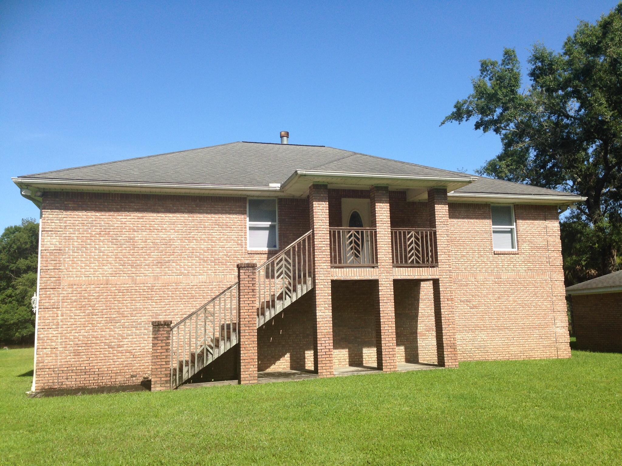 SPORTSMAN'S RETREAT and priced to SELL! The avid fisherman will surely enjoy having your own private boat launch right on the Choctawhatchee River. Relaxing fishing expeditions whether you choose to go north or south and all just 20 miles from the beautiful beaches of South Walton. The fishing table complete with running water will make cleaning your fresh catch easy. The seller built this all brick home high above sea level with the main living area being located above two large parking bays to take advantage of the picturesque views the river has to offer. Inside the 3 bedroom/2 bath, open floor plan will allow plenty of room for a permanent residence or a fishing lodge for several sportsmen. Seller also owns 3500 sq WORKSHOP across the street that can be purchased separately.