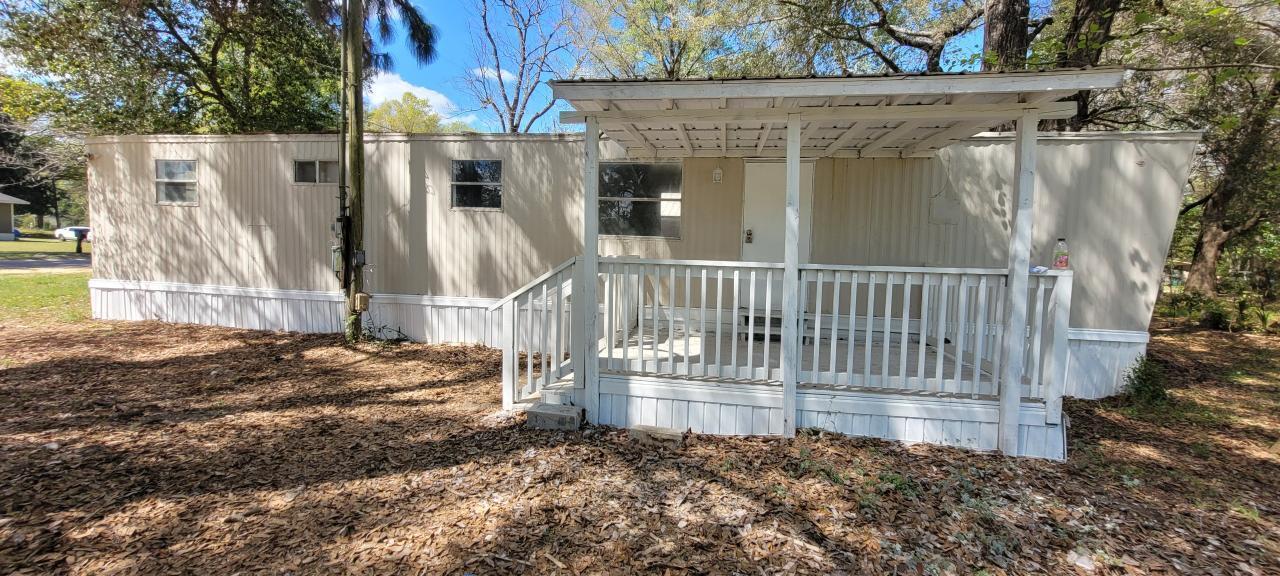 This unit sits separately from the mobile home park. It has its own driveway off the main road. Mobile home was just remodeled to include new flooring, paint, shower, etc. and has a nice covered front porch