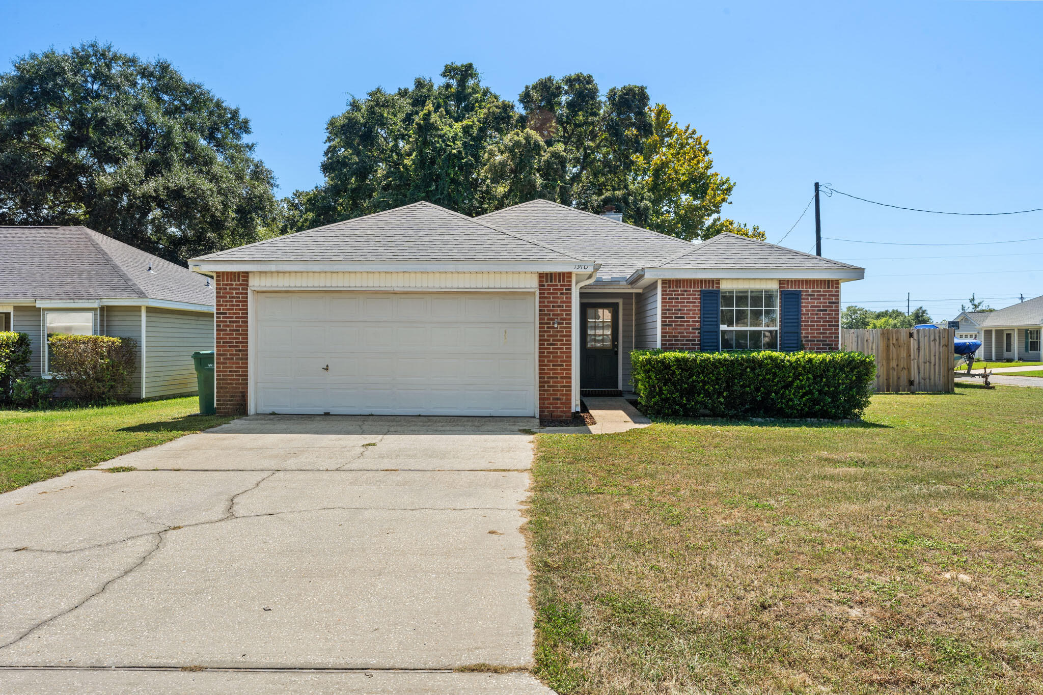 Charming 3 bed 2 bath home. The Living area is complete with vaulted ceilings, and a fireplace. Stainless steel appliances in the galley kitchen, brand new carpets throughout and a fresh new coat of paint in the entire home!  The Primary bedroom has a walk-in closet and double sinks in the ensuite. Sit back and enjoy our nice Florida weather in the fenced-in backyard complete with a deck.