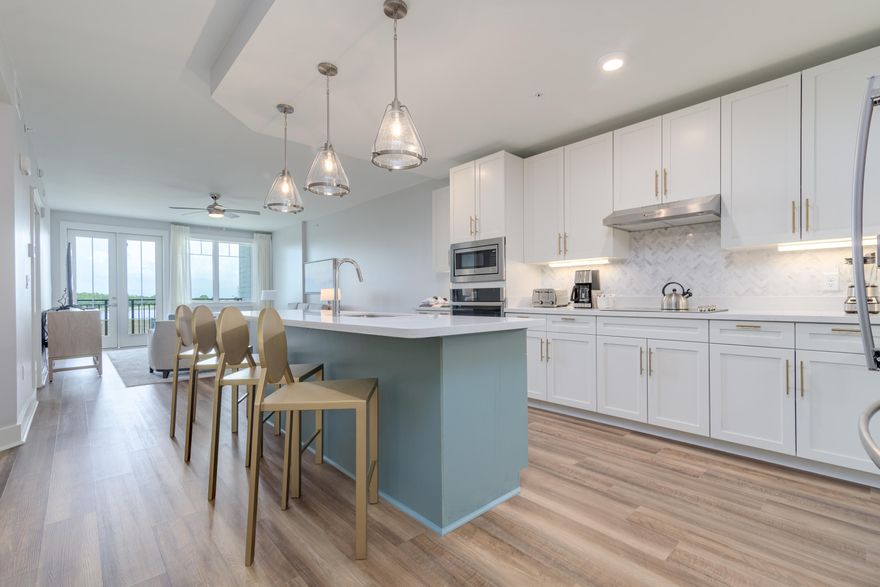 FULLY FURNISHED WITH ALL UTILITIES INCLUDED! You must see this beautifully furnished 2 bedroom, 2 bath condo with a spacious open floor plan. The condo has a fully equipped kitchen, large pantry, full-size washer & dryer, and a private balcony with views of the bayou. The Village of Baytowne Wharf is a short walk or drive away and offers fantastic dining, shopping, and entertainment options. Come relax and enjoy the luxurious resort lifestyle!