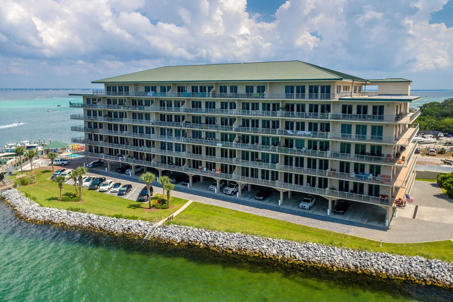 Check out the spectacular 180-degree views of the Harbor, East Pass, Gulf of Mexico and Crab Island from the expansive 378 sf balcony of this gorgeous 3-BR/3-BA condo located in the heart of Destin. Master BR and 2nd BR open directly to the balcony (facing South), the 3rd BR is on the north side with views of Choctawhatchee Bay. Custom kitchen with granite, stainless steel appliances, oversized GE refrigerator, double-ovens, pantry, and breakfast bar. The open floor plan affords water views from everywhere. Entire unit was recently painted and new vinyl (wood veneer) flooring laid throughout in 2019. Balcony was re-tiled in 2020. New custom, solid core doors were also installed throughout. Master Bath (ensuite) has dual vanities, large step-in shower, and walk-in closet.