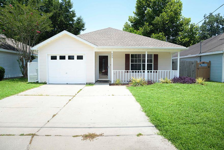 Cute mid town location, close to both bases! No carpet! All flooring is tile or laminate. Kitchen has granite counters and tile backsplash. Privacy fenced back yard with patio. No smoking inside home or garage.