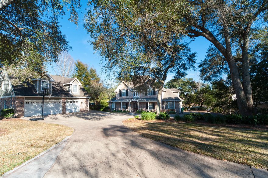 WATERFRONT Southern Charm & Splendor!!! Enjoy waterfront living and entertaining on this residence's exceptional homesite and high elevation. The spacious main residence boasts 5 bedrooms, 3.5 baths, soaring ceilings, expansive water views, pool/jacuzzi with large pool deck. Interior features include, custom faux finishing, high-grade mill work, hardwood floors, stainless appliances, 8 ft. interior doors, and two-car garage. Additionally, there's a detached three-car garage with a fully equipped and finished garage apartment above. Exterior features include many, mature trees, lush landscaping, large-circular driveway, boat dock with 35,000 boat lift and amazing views of Poquito Bayou! Make 17 Poquito Road your family's waterfront estate today.