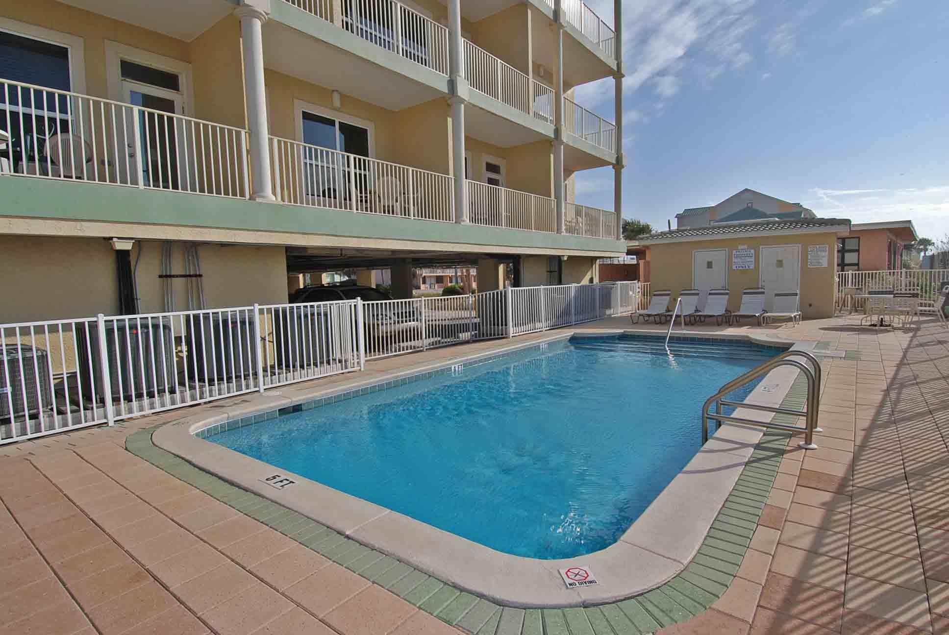 TOO GOOD TO BE THIS AFFORDABLE! Gorgeous Gulf front condo, corner location with sensational unobstructed water views! This nicely decorated and accessorized unit with ten foot ceilings, tile flooring, crown molding, a huge balcony, and granite counter-tops with hall bunks making it an outstanding beach getaway and rental. Blue Dolphin is a low profile building with only ten units, a heated gulf front pool and underground parking.