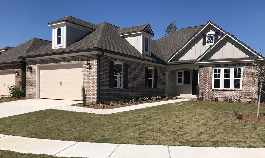 Beautiful Hawthorne 2 floor plan in the exclusive Meadows at Hammock Bay neighborhood.  Featuring 3 bedrooms plus and flex and 2 1/2 baths this home is a stunner.  Open kitchen to family room with stainless appliances, large island, wood harbor cabinets and Alaska white granite counter tops.  Master bath features large walk in shower.  Laminate floors in living areas and tile bathrooms.  Fully sodded and sprinklered yard.  Crown moulding, 5' base moulding, and cased windows.  9' ceilings and 8' doors.