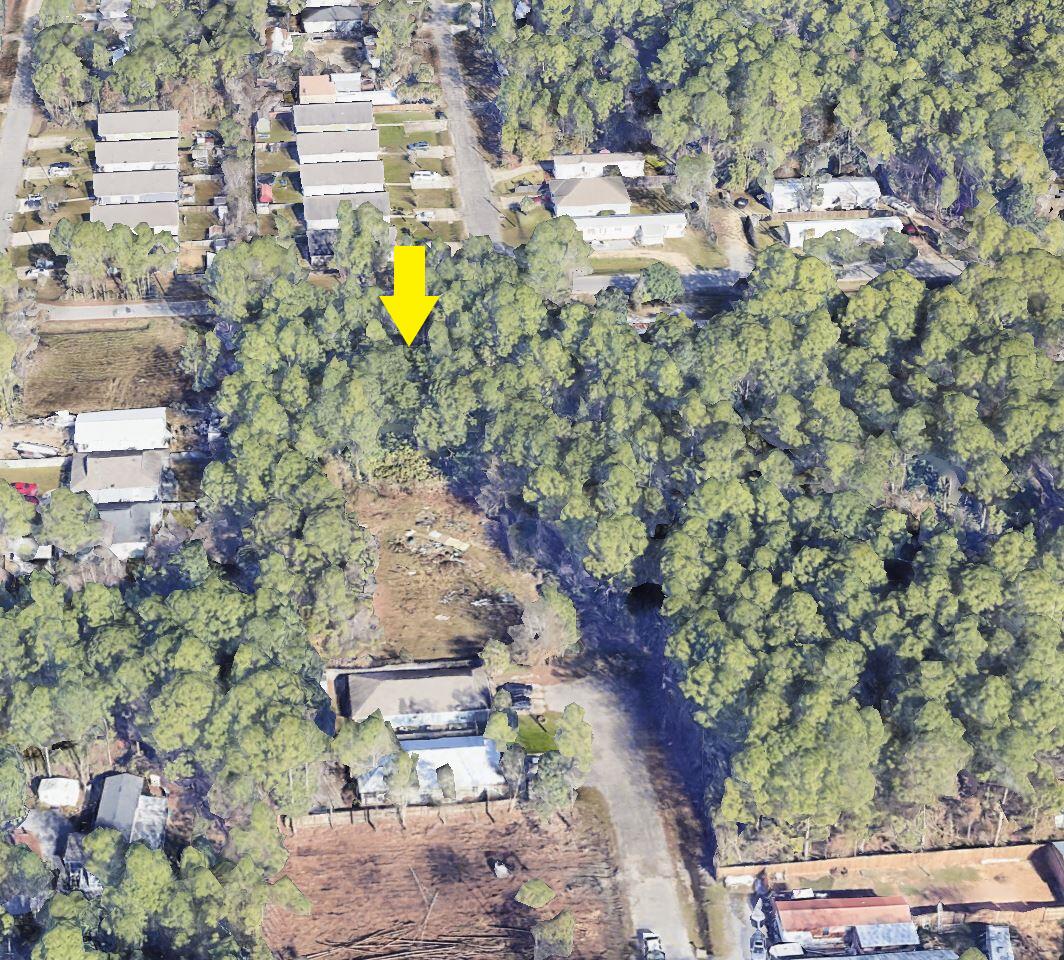 Located in Old Town Santa Rosa, a fast-growing area, this wooded property spans 0.28 acres inviting endless possibilities for your future permanent residence or investment property. With no HOA & no build out time frame, this property allows you the freedom to design and construct your ideal retreat. Embracing the charm and allure of living along the Florida Panhandle, the property is conveniently located near the Choctawhatchee Bay & Cessna Boat Landing, and within 4 miles to the white sand beaches of the Emerald Coast.