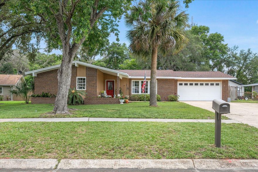 Welcome to this move-in ready gem, just 10 minutes from the beach and Hurlburt Field! This fantastic property features a spacious driveway, perfect for multiple cars and even an RV. Located within a hop, skip and a jump to both the middle and high schools.Inside, you'll find luxury vinyl plank flooring in the main living areas and beautiful granite countertops in the kitchen.  Walk in to your formal sitting area, living room and dining room, this open concept makes conversing a breeze. The oversized garage includes a workbench and built-in cabinets that will stay with the home, offering plenty of space for projects and storage.