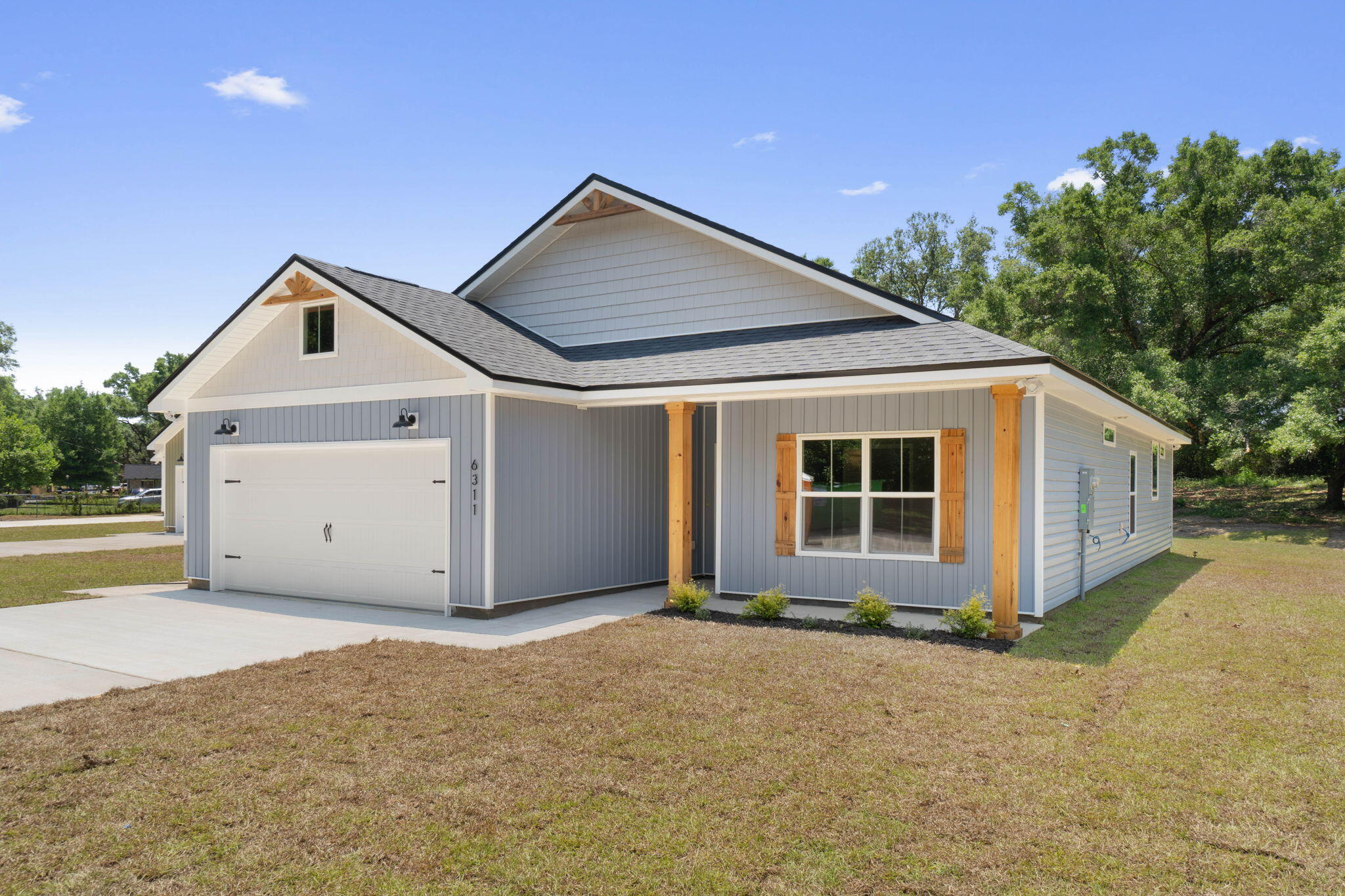 Almost half of acre lot in the heart of Pensacola!!! Huge backyard. Welcome to your dream home! This semi-custom craftsman inspired brand new home offers spacious living with 3 bedrooms, 2 bathrooms, and endless opportunities to make it your own. The home's standout features include custom cypress wood beams and vaulted ceilings, adding warmth and character to the already beautiful design. All our design features and finishes make for a modern and comfortable living experience that you'll enjoy every day. The master bathroom boasts a luxurious free-standing tub and beautifully tiled shower, offering a spa-like experience at home. But what truly sets this home apart is the opportunity to personalize it to your exact preferences. You'll have the chance to choose from 10 differentflooring options, select your preferred quartz color, and even pick out the cabinet colors that speak to you. This is not your average builder-grade house - it's a true gem waiting for your personal touch. This incredible home is brought to you by family-owned business that builds homes with heart. When you purchase this home, you'll not only be investing in a beautiful property but in a company that values integrity, craftsmanship, and customer satisfaction. We take pride in every home we build and ensures that each one is a reflection of our commitment to quality and excellence. With a focus on personalized service and attention to detail, you can trust that your home-buying experience will be second to none. Don't miss out on this opportunity to own a beautiful, semi-custom home built by a company with a heart. Contact us today to learn more about how you can make this house your forever home. *Estimated completion time is the middle of February, 2026* THESE ARE STOCK PHOTOS- NOT ACTUAL LOT SPECIFIC FINISHES. PHOTOS ARE OF SIMILAR PROPERTIES THAT WERE BUILT.