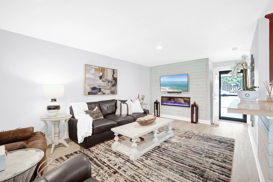 Golf cart conveys! Welcome to luxury living at its finest, 518 Augusta Way #11002. This meticulously updated 2-bedroom, 2-bathroom residence is nestled within the upscale community of Sandestin Golf & Beach Resort. Its spacious living area allows you to entertain with ease. Stylish shiplap embedded with its high-end electric fireplace creates a cozy ambiance on cooler evenings. There's also a secondary seating area perfect for a sleeper sofa and room for plenty of guests. The kitchen features, a custom Amish-crafted hickory butcher block kitchen countertop, Thomasville Cherry kitchen cabinets, a new Bosch Super Quiet dishwasher and new GE Convection Oven with Air Fryer feature--perfect for the culinary enthusiast. The kitchen also boasts stainless steel dimensional subway tile accents that complement the modern, yet rustic aesthetic. This double ensuite home provides the utmost comfort. 
Retreat to the either bedroom suite offering double vanity sinks in each bathroom. There's also a large walk-in closet in one of the bedrooms along with a nice soaking tub and serene views overlooking the beautifully landscaped backyard, perfect for peaceful relaxation. The homes Stiebel tankless water heater and the Grandaire HVAC system (serviced by Peadon Smartcare) ensures efficiency and comfort, both units just 4 years old. In addition, the roof is a mere 2 years old. The family-friendly community of Sandestin Golf & Beach Resort offers upscale amenities including shopping, dining, events, beach & water sports, recreation & activities, golf club, tennis club, fitness club, Club KZ, pools and marina. Being Sold mostly furnished. Short term rentals allowed. Well maintained dog walk with waste stations just out the back door.