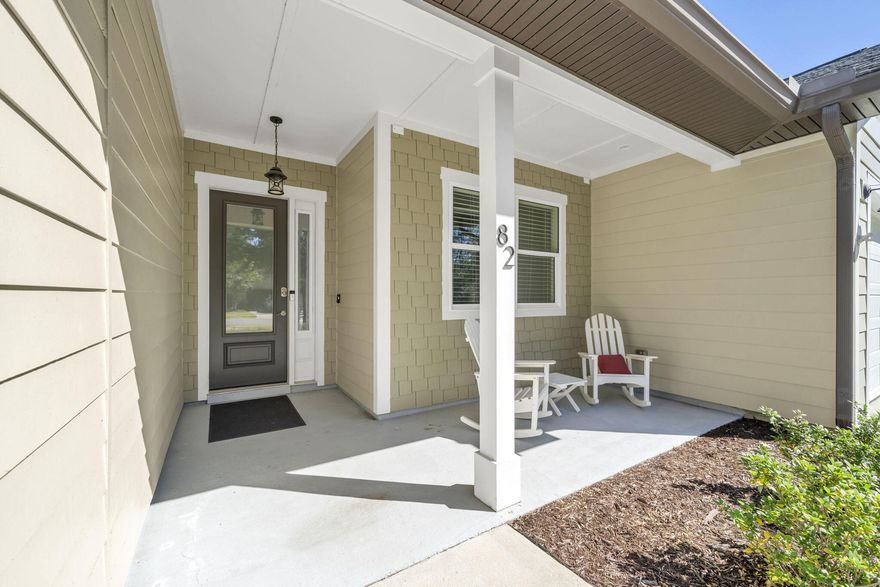 A welcomed elegance awaits at this custom-built gem, crafted by talented local builder, John Cunningham, on a quiet street. Enter through 8' exterior doors to the open concept floor plan featuring 10' ceilings (11' in living room) with nearly floor to ceiling windows, providing an abundance of natural light. The tranquil backyard is the perfect setting to create a cohesive living environment with the outdoors as enjoyed from the spacious back screened porch. The kitchen features a single basin sink centered on an oversized kitchen island with built-ins/deep drawers on every side; perfect for keeping gadgets and mixing bowls within easy reach. It's as practical as it is impressive, ready to handle meal prep, morning coffee chats, or the inevitable gathering spot during every party. The primary suite features a comfortable sitting area in the large bedroom with custom trey lighting, a private bath w/ walk in shower featuring dual controlled, multiple shower heads, and a separate soaking tub, dual separate vanities, one with a sitting area, & a massive custom closet. The third bath for the remaining two bedrooms feature double vanities, with a doored private room for the shower area. This homes prime location within Hammock Bay puts its residence in close proximity to the town square, amenities, sports complex, and the middle school. Hammock Bay is a premier, bayfront master planned community located just 15 minutes north of the white sand beaches of the Emerald Coast. A 6,000 square foot clubhouse offers residents use of the movie theatre with auditorium seating, a full caterer's kitchen to include wet bar and dining area, childs play room, and lounge overlooking the lake and pool area. Numerous on site workout and fitness facilities, competition lap pool, additional 4 Resort-style pools, pickleball courts, tennis courts, basketball court, large playground, outdoor kitchen/gas bbq areas. A Bay front club house with fishing pier extending 500' in to the bay, an amphitheater like stage with jumbotron screen, are just a few attractions with more on the near horizon! All residents at Hammock Bay will enjoy year-round social events as well as a vibrant and active Town Center. Consider this an invitation to experience the Hammock Bay Lifestyle by contacting me today for an updated list of this months community events calendar!