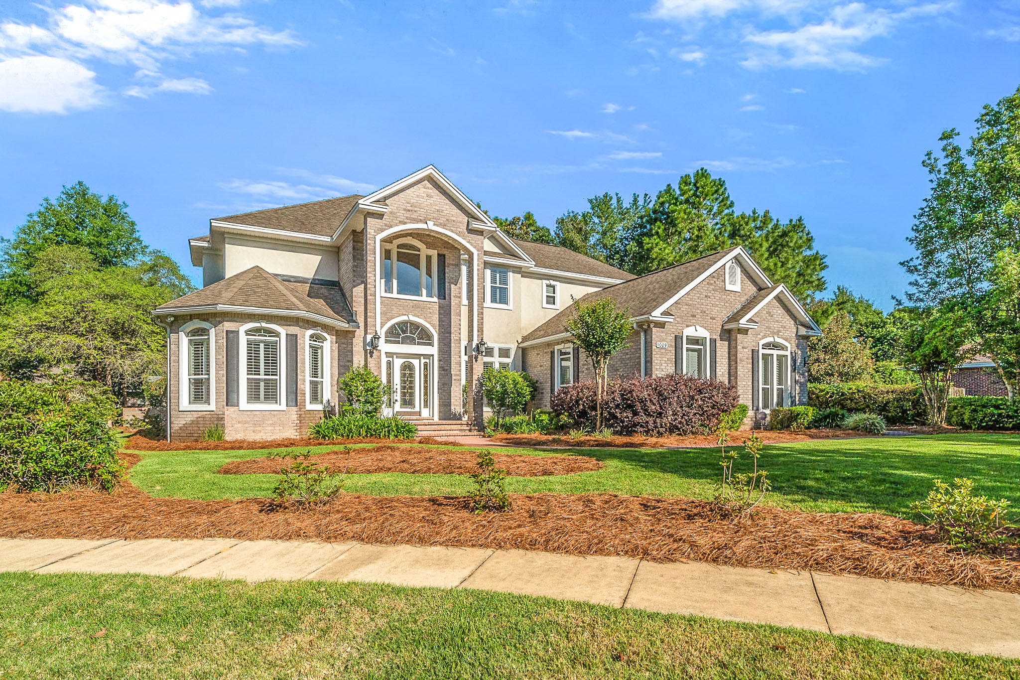 This is it. Located in desirable Swift Creek, this home has everything you've been looking for: five bedrooms, five bathrooms, plus an office, in ground swimming pool, spa and a 3 car garage! Brand new engineered hardwood floors greet you in the entry and carry you through most of the lower level. The combined kitchen and family room are the heart of the home complete with new appliances(refrigerator, double ovens, dishwasher), electric cook top plumbed for gas, new sink and faucet, granite countertops, a fireplace and room for a large family dining table. For holidays and large gatherings, you'll have plenty of space to entertain in the formal living room with fireplace and soaring, 20+ foot ceilings. The spacious master bedroom has a separate exit to the patio, electric