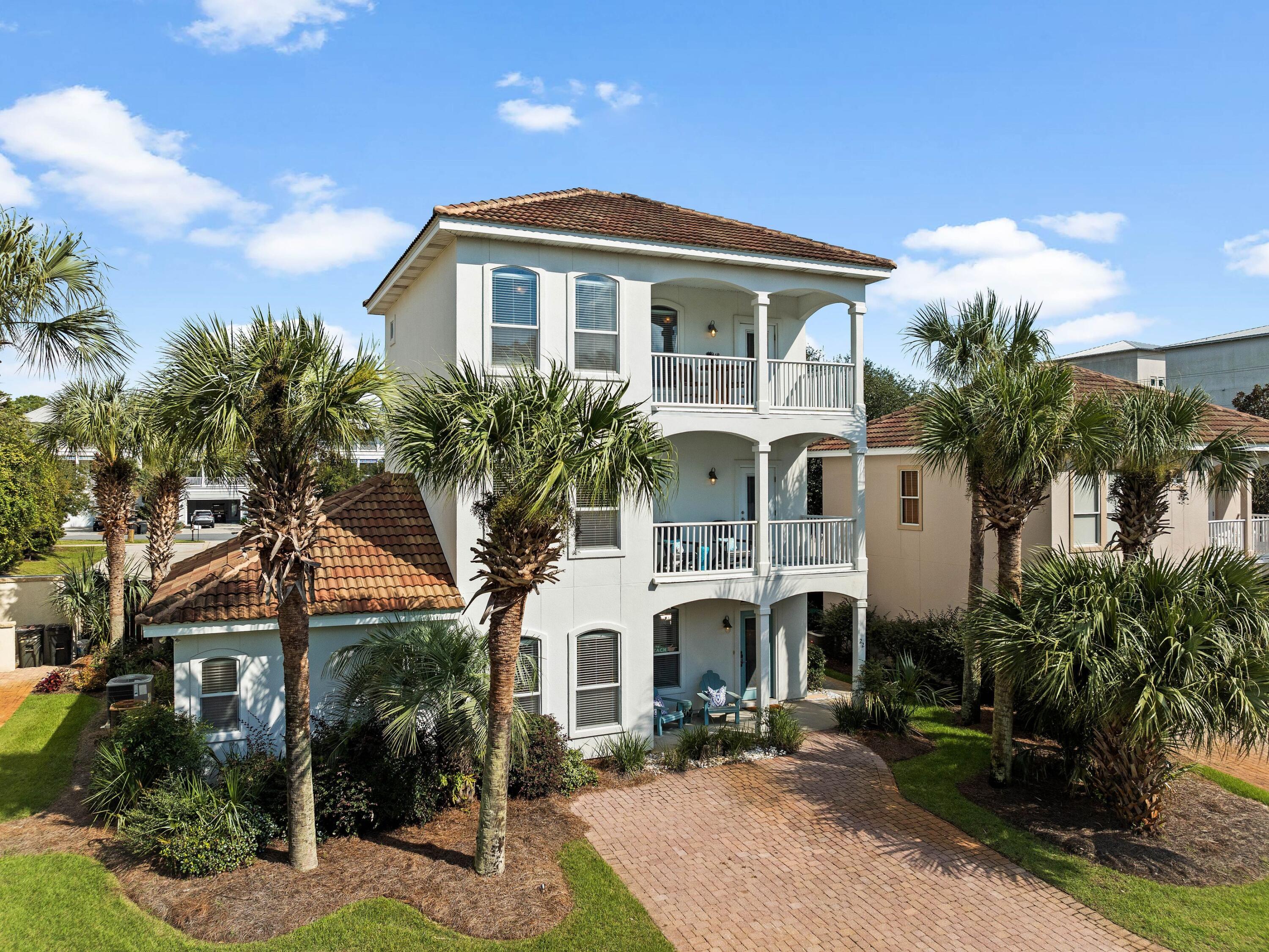 Experience the ultimate 30A beach lifestyle with Aqua Seas, a stunning three-story Mediterranean-inspired beach house Las Palmas community. Just a short walk to Spooky Lane and Shell Seekers Beach Access and nearby dining and shopping options, this fully furnished five-bedroom, 3.5-bathroom home is perfect as a vacation rental, second home or even a primary residence. With gulf views and an additional bonus room on the third floor that can serve as a fifth bedroom, den or office space, this property offers both luxury and versatility. Step inside to an open-concept first floor, where neutral tones and coastal-inspired decor create a relaxed, chic atmosphere. The spacious living area flows seamlessly into a well-appointed kitchen featuring granite countertops, stainless steel appliances and seating for 10. Perfect for entertaining, the living space opens to a large patio with a grill and plenty of room to unwind.  The master suite is conveniently located on the main level, while the upper floors host additional bedrooms, including a third-floor room with panoramic gulf views. Luxury vinyl plank flooring stretches throughout the home, offering easy maintenance and modern style. Recent updates, including a refreshed kitchen and a newly added paver patio in the backyard, enhance the home's appeal. Located near Gulf Place, Aqua Seas offers proximity to 30A's best bike trails, nature paths, and popular dining spots like Shunk Gulley. With access to four nearby beaches  Ed Walline, Shell Seekers, Spooky Lane and Gulf Heights  your coastal paradise awaits. Whether seeking a tranquil retreat or an investment opportunity, this home delivers on all fronts.
