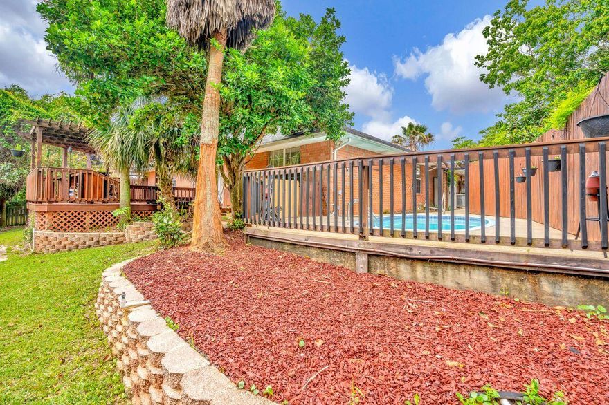 LOOK!*$7,500.00 closing cost credit with full price offer!*Do not miss this amazing 2430 square foot pool home. An all brick, 4 bedroom, 3 bath home with multiple amazing upgrades. Custom built kitchen with granite counter tops, wrap-around breakfast bar cantilevered bracing. 42'' cabinets, stainless steel appliances, raised ceilings, fireplace, plant ledges, hardwood flooring in formal dining area, 2'' mini-blinds, tile floors in wet areas, etc. Come make this beautiful home yours today!