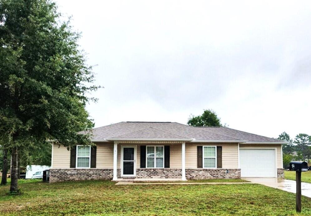 LAKEFRONT HOME on OPAL LAKE! Ready for full-time resident, vacation-home owner or investor. Ideal location for long or short term rental. Home is partially furnished & offers a split-bedroom floorplan with an open Living & Dining Room. Kitchen is partially stocked & features Granite countertops & tile floors. Washer & Dryer remain with sale. Fenced area off back deck for pets or people! Convenient location on the west side of DeFuniak Springs & near Highways 90 and 331. Great fishing in the local Lakes - King Lake, Juniper Lake & more. Saltwater fishing is within 30 minutes in the Choctawhatchee Bay or the Bayous. Fun-in-the-Sun on the Beaches of South Walton is less than 35 miles to the south! Check out this Lakefront Home - it has much to offer and is ready to go!