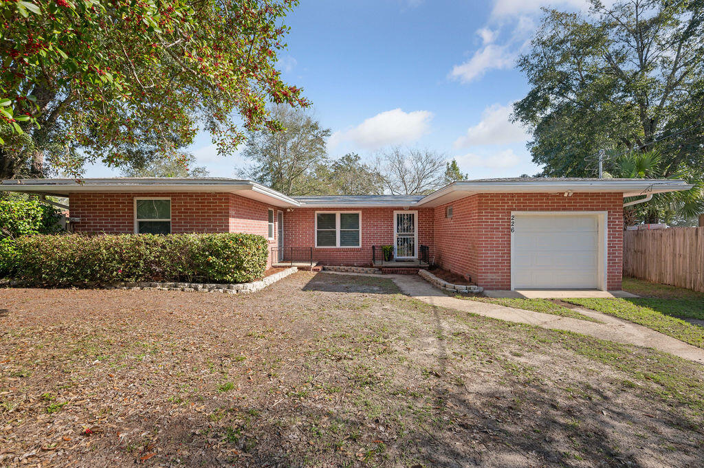 Built in 1958, this charming all-brick home sits on a generous 0.29-acre lot, offering ample space for outdoor activities. Designed for both comfort and functionality, it blends vintage character with modern updates. Ideally located just one mile from the waterfront city park, which is perfect for outdoor leisure. and less than two miles from Eglin AFB, this home offers both charm and convenience. Inside, the thoughtfully designed layout includes a walk-through living and dining space, three bedrooms, and one bathroom. Major updates enhance both style and efficiency, including a full home rewire, kitchen remodel, HVAC and water heater replacement, impact windows, and a wind-rated garage door, all completed in 2015, along with a new roof in 2017. Whole-home gutters were also installed to improve durability and ease of maintenance. The fully fenced backyard provides plenty of space for entertaining, gardening, or future amenities, while the large patio creates the perfect setting for outdoor gatherings. A one-car garage and storage shed offer flexibility for extra storage, a home gym, or even a workshop. Though the seller has never lived in the home, it has consistently generated $1800-2,000 in monthly rental income, making it a fantastic investment opportunity. Whether you're looking for a primary residence or a rental property, this move-in-ready home is a must-see! Schedule your showing today! All information is deemed reliable but should be independently verified by buyers.