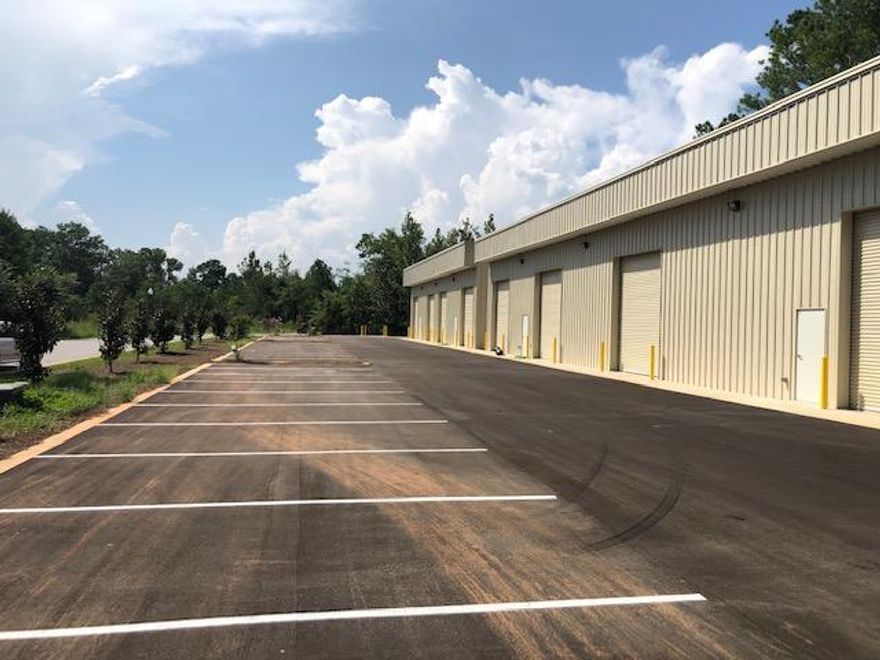 Baygrove Commerce Park' Buildings 1 & 2  each convey  5,600 sqft., totaling 11,200 square feet of Flex Warehouse Space between both buildings.  Each building  offers wide open floor plans with up to (4) 12x 12ft roll up doors and 2 front entry doors, and H/C Office and ADA Bathroom in each building.  Each building can be divided in half for tenants seeking 2800 square feet. Ceiling height is 24 ft and 22 ft eave heights. Each building has 16 parking spaces, 1 handicap space, and  a trash receptor area and loading zone space.   Power source is 220V with 3 Phase Power Supply close to buildings, along with natural gas that can be brought to subject property.