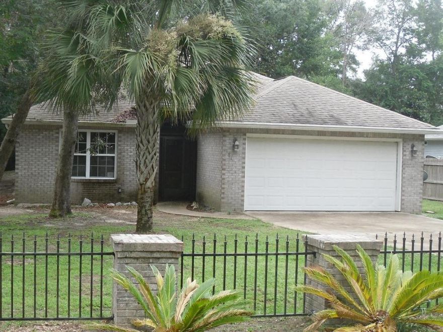 This Home offers 3 bedrooms, 2 bathrooms, screened in Patio and 2 car garage. New flooring in most of the home, updated kitchen. New stainless appliances. Fenced back yard. Lots of storage space. Separate laundry area.Quiet area, only ten minutes to beaches and a couple minutes to boat launch (black creek area). No owner financing.