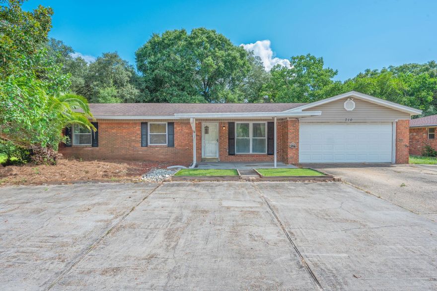 Welcome to this spacious Mary Esther home, perfectly situated just minutes from the emerald waters of the Gulf and Hurlburt Field. Offering a functional layout with generous living areas, this property is designed for both comfort and convenience. The inviting living room flows seamlessly into the dining and kitchen spaces, making it ideal for entertaining. The kitchen provides ample cabinetry and prep space, ready for everyday cooking or hosting gatherings.Enjoy the privacy of a large backyard, perfect for outdoor living, gardening, or future customization. With multiple bedrooms and bathrooms, the home accommodates families, guests, or a home office setup with ease. Additional highlights include a two-car garage, plenty of storage, and a prime location close to shopping, schools, and local amenities.

Whether you're looking for a primary residence or an investment opportunity, this Mary Esther gem offers great potential in a sought-after location.

All information is deemed accurate but should be confirmed by buyer or buyers agent. 
