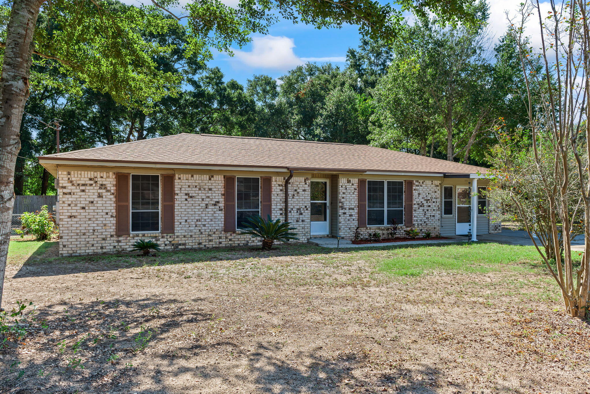 Welcome home to this charming 3 bedroom 2 bath brick home located in a prime location. This property offers a thoughtful combination of classic charm and modern updates, including a brand new roof for worry free living! Just minutes from shopping and food, perfectly blending comfort and convenience. This property is the perfect opportunity to own a piece of Milton charm. Schedule your showing today!