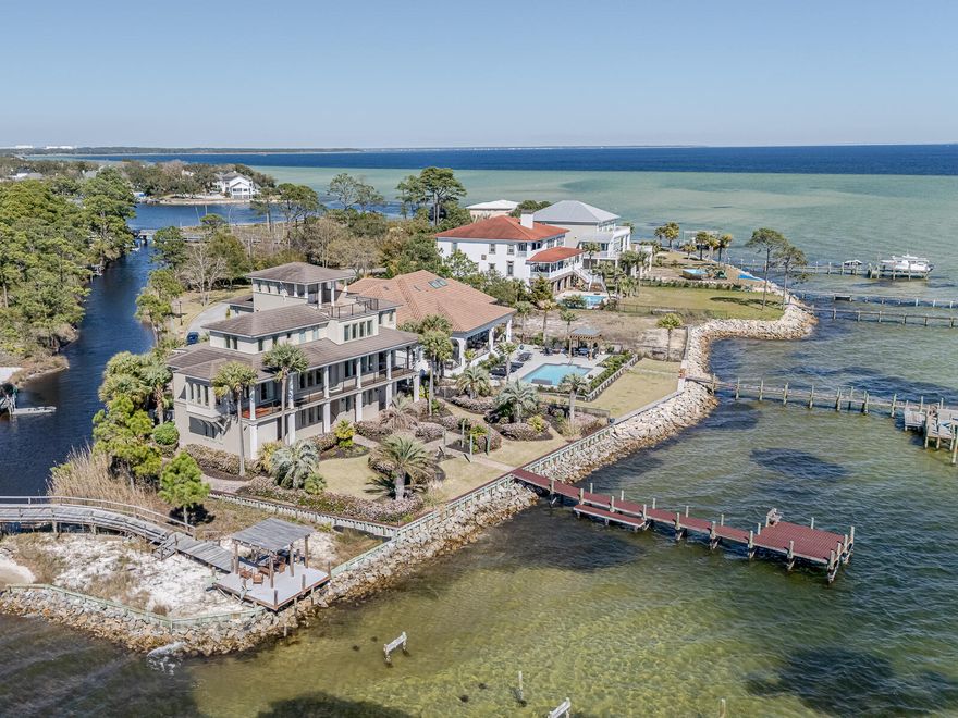 Stunning Waterfront Luxury Home with Panoramic Bay Views!Imagine waking up every day to breathtaking panoramic views of Choctawhatchee Bay. The best part? You can enjoy these stunning vistas from every angle on the top floor of this exceptional home. Whether you're sipping your morning coffee or unwinding at sunset, the views are nothing short of spectacular--stretching from Shalimar and Fort Walton Beach to Destin and the Mid-Bay Bridge.With over 100 feet of deeded waterfront access and two private docks, this property is nestled within a gated island community, offering both privacy and exclusivity. You'll be just minutes from beaches, airports, military bases, and shopping--yet tucked away from the crowds of tourists. Inside, you'll find commercial-grade Wolf kitchen appliances, a custom movie theater, a woodworking shop, and a study with coffered ceilings. A full-service elevator offers easy access to every floor. The geo-thermal HVAC system and hurricane-insulated windows and doors provide energy efficiency and storm protection, while a whole-house generator ensures uninterrupted peace of mind.

Designed with impeccable attention to detail, this home features intricate crown molding throughout. Say goodbye to clutter with spacious storage solutions for everything from seasonal gear to everyday essentials. Enjoy custom closets, built-in shelving, and hidden compartmentsgiving you room for everything you need and more.

This home was engineered and built to last with unmatched strength and superior construction. Built on concrete pilings driven 30 feet into the sand and using 5,000 PSI concrete (compared to the standard 3,000 PSI), it offers exceptional durability. The slab is reinforced with extra rebar, making it highly resistant to even the most extreme conditions, including hurricane water action.
Every detailfrom the oversized plywood to the solid concrete block wallshas been thoughtfully constructed to deliver superior strength and peace of mind, along with potential savings on your homeowner's insurance. Built to withstand the elements. Built for a lifetime.
This is not just a houseit's a fully customized Randy Wise home, crafted to stand the test of time, with every corner thoughtfully designed for luxury and resilience.
Call today to schedule your exclusive showing!