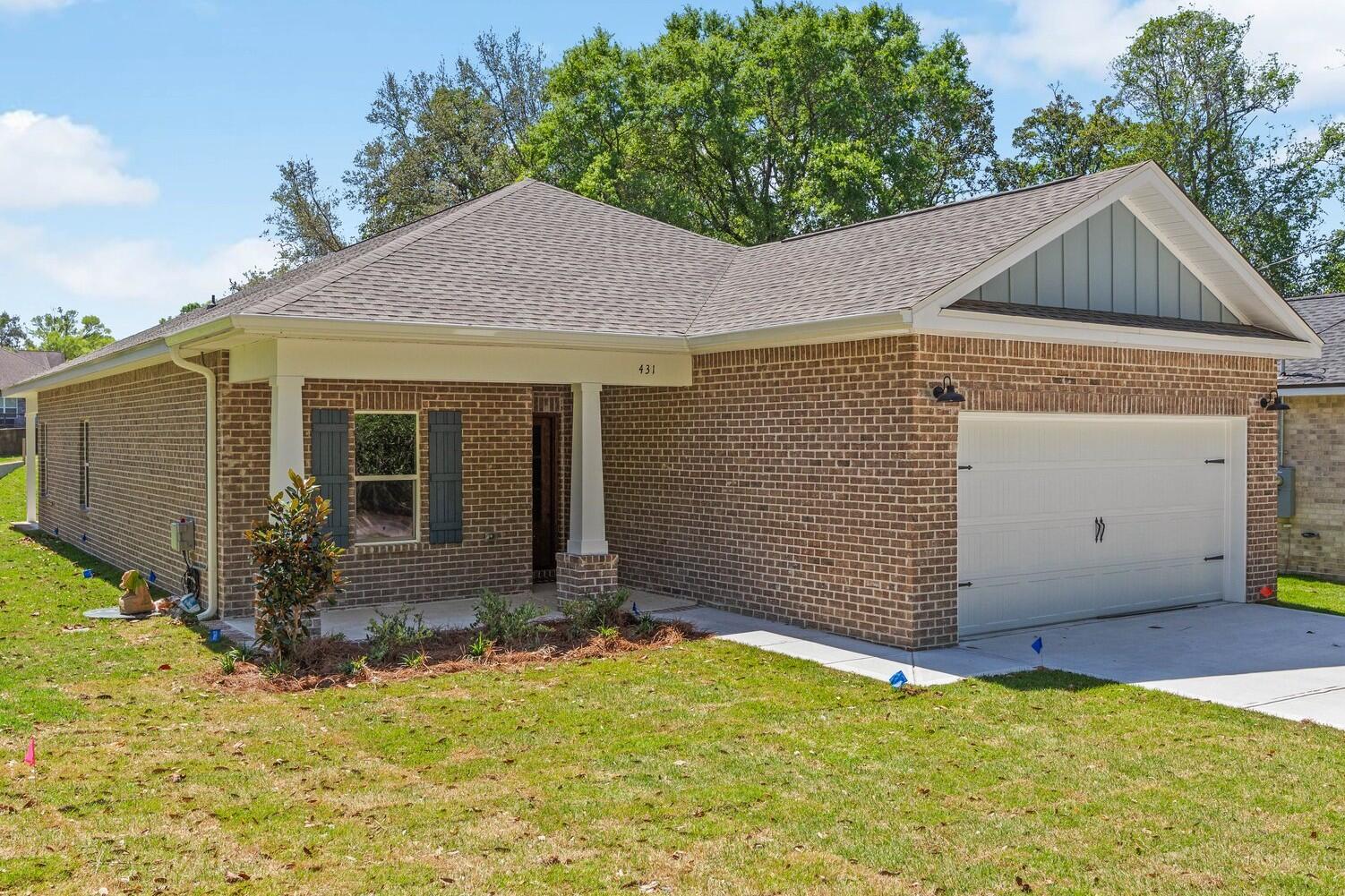 Open House Tues. Weds. & Thurs. 3-5pm. Nestled in the city of Niceville is where you will find this lovely home. Newly constructed, offering 4 bedrooms and 2 full bathrooms. Step inside and appreciate the inviting open split floorplan with exceptional finishes. As you enter, you'll discover a versatile space that can serve as a dining area, a home office, or a cozy nook. The kitchen is a true standout, featuring stainless-steel appliances, Shaker-style cabinets with soft-close mechanisms, a generous pantry, elegant quartz countertops throughout, and timeless backsplash. The owner's bedroom boasts a spacious closet and a private bathroom with a beautifully tiled shower and double vanity. Throughout the house, you'll find low-allergen, waterproof LVP flooring for your comfort. This location offers the convenience of nearby shopping, entertainment, and a swift commute to Eglin Air Force Base, Duke Field and surrounding cities. Enjoy outdoor living; step outside to the backyard where your family, friends, and pets can enjoy outdoor activities and entertainment. The large covered back porch is the perfect spot for grilling and provides an inviting outdoor sitting area for relaxation and entertainment. See photos for Builder Spring Incentives!