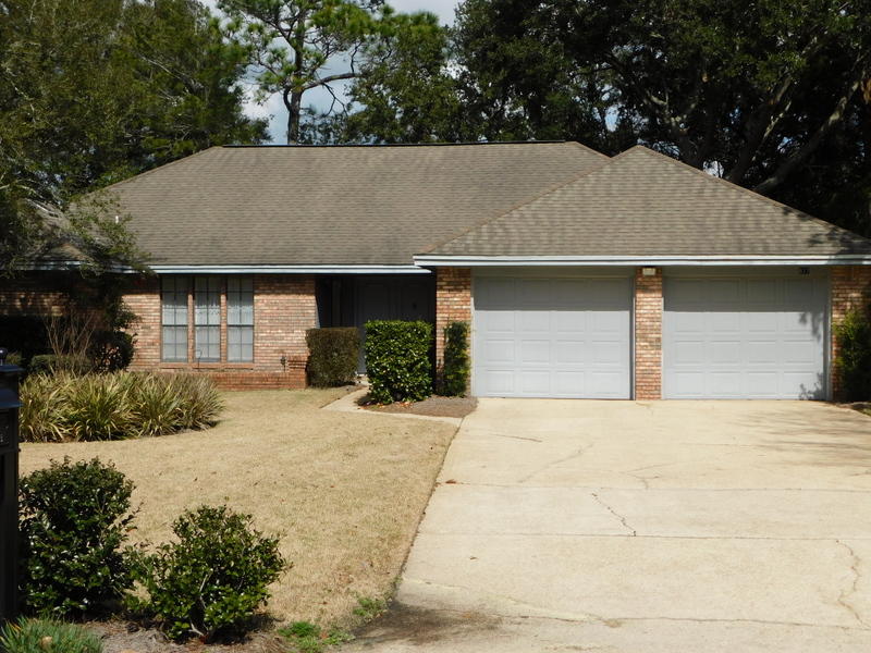 Classy Ranch style home in the heart of Bluewater Bay and located on a desirable dead-end culdesac street. The exterior is manicured with plush lawn, well groomed and a large deck out back for entertaining. There are large Oaks and privacy wood fence in the back. The home sits back from the street and allows for several cars to park in the extended driveway. Inside, you will find a split bedroom floor plan, a wood burning fireplace, vaulted ceilings, a formal dining room. The master bathroom has his/hers sinks and walk-in closets. The home is in need of some updating but is a very solid, all brick home with a great floor plan, an excellent location and huge potential . This would make for a great place to call home or would be a great investment property! Hurry on this one.
