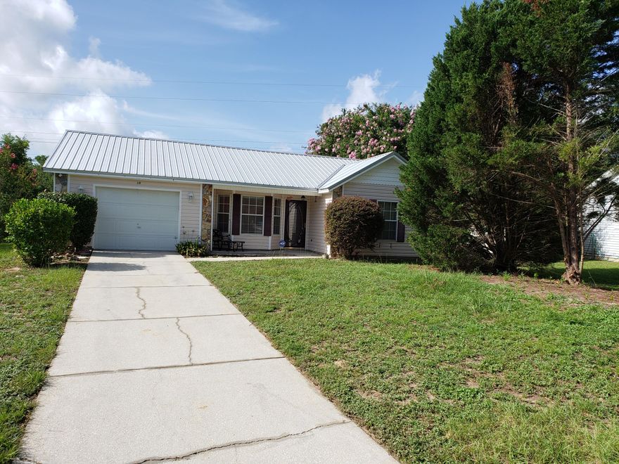 This 3 bedroom, 2 bath, 1 car garage home is centrally located and ready for you!  The living room area has high ceilings and wood laminate flooring. The kitchen has a breakfast bar and fridge, stove/oven, microwave, and dishwasher. The bedrooms are a split bedroom floor plan and all have new carpet. Outside boasts a screen porch, storage shed, and a very large backyard space. One car garage for storage needs and lots of driveway parking as well. Come by and check out this property for rent!