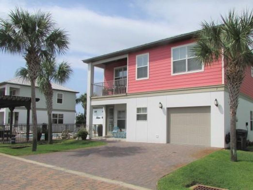 PRICE REDUCED! Leisure Bay has 10 homes in this lovely and quiet beach community - only 3 blocks to the beautiful beaches. Immaculate home that will not disappoint with all its upgrades: All tiled, 9 ft ceilings, crown molding throughout, tiled showers and tubs, granite countertops, modern lighting and fans. Two large living areas w/lots of light. The Kitchen has stainless steel appliances, a bar that seats 3 & an elegant metallic tile backsplash. There are 4 full bathrooms w/beautiful tile, granite & pendant lights. The oversized one car garage has lots of built-in storage. HOA takes care of all lawn maintenance, pool & picnic area. The streets & driveways are paved w/concrete pavers. This is a community of Permanent, Second Home & Short Term rentals. Termite Bond too! Unfurnished.