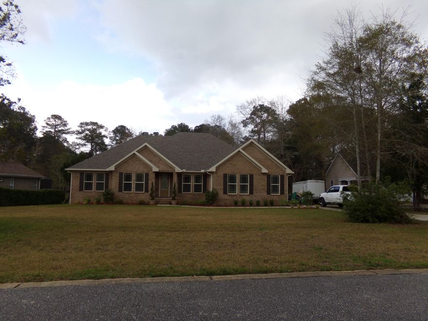 All Brick, Open floor plan, 4 bedroom, 2 1/2 baths, side load garage just north of town~ Gas stove, water heater & heater~ The kitchen offers stainless steel counter sink, granite counter tops with breakfast bar~ Laundry room and bath rooms are tiled with granite counter tops~ 9 foot ceilings throughout with crown molding in master bedroom, formal dining room and great room~ Great room has 8' sliding glass doors opening to nice covered porch~ Split floor plan and the Bedrooms have friese carpet~ Large master suite with double vanities with granite counter tops, over sized garden tub with tiled separate shower~ This house is in last stages and should be 100% complete by the end of April~