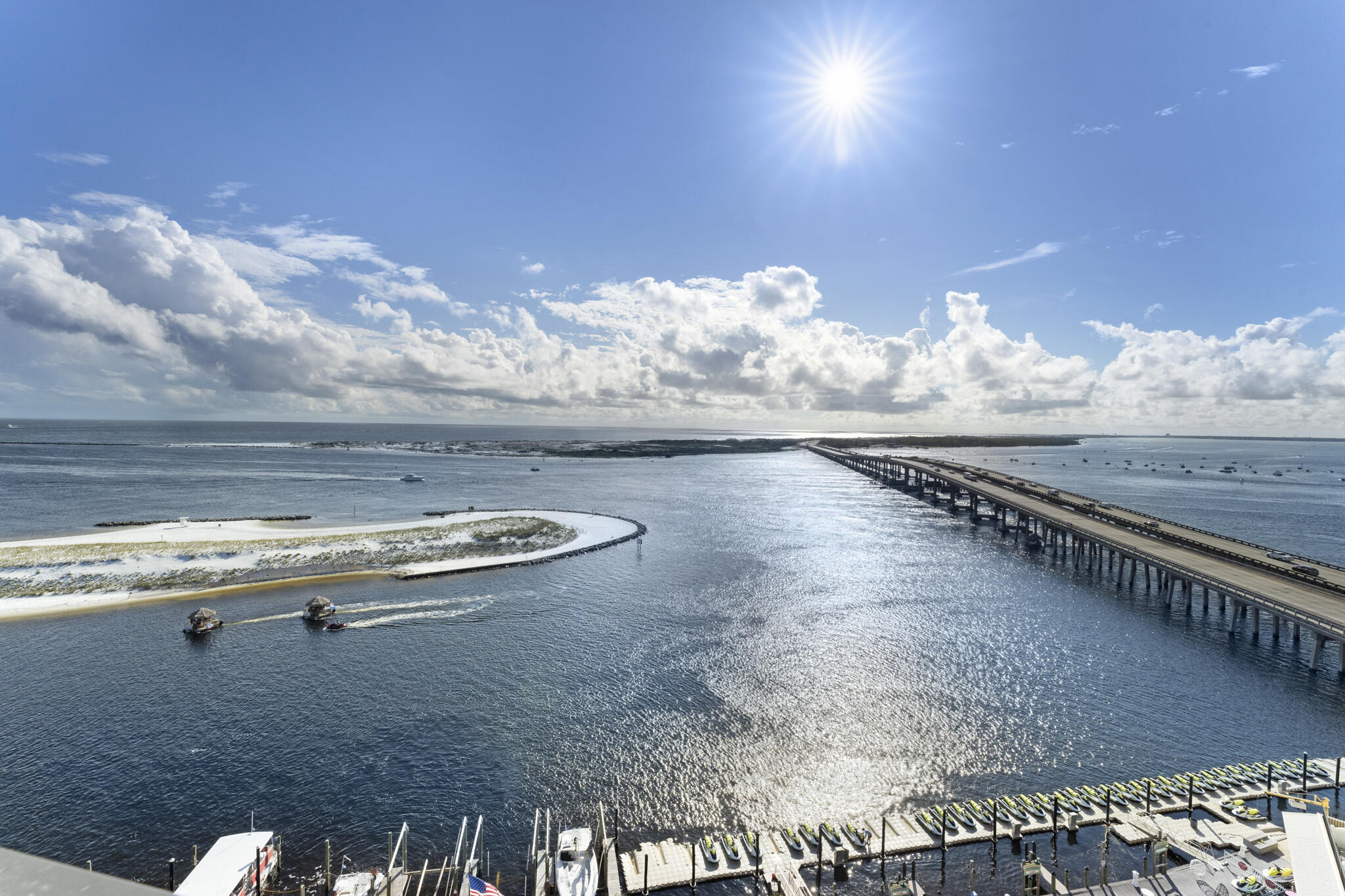 Spectacular views of the Destin Harbor, East Pass, Destin Bridge, Crab Island and the Gulf of Mexico. In late 2019, W726 was completely updated. Terrific Rental condo on the Emerald Coast. Amenities galore include European spa and fitness center, business center, on site restaurants and lounges, two marinas, full service valet, underground parking and ultra luxurious pool deck with harbor views and Deck Bar. Walk to your favorite restaurant or shop. Interior design features include 9ft ceilings in main living area and spacious balcony and grand terrace. Crown molding throughout. Kitchen includes stainless steel GE Profile appliances, granite countertop with bar and Italian porcelain floors. Four Bedrooms and Baths. Rental Income Exceeds $95,000 per year. Many, many more fabulous features!