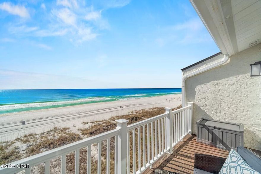 GULF-FRONT, NO HOA, RENTAL READY! Step directly onto the sugar-white sand from this remodeled 5-bedroom, 4 full baths beach retreat offering sweeping Gulf views from the main living level and private bedrooms. Designed for gathering, the open living/dining/kitchen frames the emerald water as the backdrop for sunsets, seafood nights, and memory-making. A clever 10' x 12' loft in one bedroom creates an extra sleeping zone or kid-approved hideaway--ideal for maximizing guest capacity. Recent updates and the seller-reported 2,232 sq ft of heated/cooled space include an enclosed former garage that expands everyday comfort and rental flexibility. Multiple bedrooms on separate levels provide privacy for larger groups, while four full baths keep beach days effortless. Outside, rinse off and head straight to the deck to watch dolphins cruise and the sky glow at golden hour. Major perks: NO HOAa rare Gulf-front find that supports short-term rental potentialplus a layout and location travelers love: direct beach access, panoramic views, and minutes to coastal dining, shopping, and entertainment like Top Golf. Dolly's Pirate Voyage, Pier Park!.