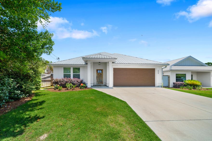 'CURRENTLY UNDER CONTRACT, SELLER WILL CONSIDER BACKUP OFFERS'Turnkey with the interior freshly painted and exterior power-washed! This home is ready for the 2025 vacation rental season!Beach Life Awaits! Your Dream Coastal Retreat Is Here!Get ready to live the ultimate beach life in this stunning home that combines modern comfort with coastal charm! Just 0.6 miles to Beach Access 86, you'll be enjoying the sun, sand, and Gulf in no time. The Location? Absolutely Perfect!
Whether you're a foodie, a shopaholic, or an outdoor adventurer, this home puts you right in the middle of all the action:
	"	10 minutes to Pier Park - The go-to spot for shopping, dining, and fun! Coming soon: Dolly Parton's Pirates Voyage Dinner & Show is set to open in Panama City Beach in spring 2025 and a Topgolf facility will feature 74 outdoor, climate-controlled hitting bays across two levels, a restaurant, bar, 22-foot video wall, more than 140 TVs, and an outdoor patio!!
	"	8 minutes to Rosemary Beach & 30A - Think chic boutiques, world-class restaurants, and those dreamy beach vibes. 
	"	6 minutes to Camp Helen State Park - Ideal for kayaking, hiking, or just soaking in nature.

Room for Everyone
This home was designed with your crew in mindhosting up to 12 guests with 3 spacious bedrooms, 2 full bathrooms, and parking for 5 vehicles. There's plenty of room to spread out, relax, and enjoy.

Inside = WOW Factor!
	"	An open floor plan with coffered ceilings that ooze elegance.
	"	A cozy electric fireplace in the living roomperfect for relaxing after a day in the sun.
	"	A chef's kitchen with quartz countertops, a tile backsplash, and high-end Samsung stainless-steel appliances. The farmhouse barn door leading to the pantry? Adorable!

Outside = Beachside Bliss!
Step into your private fenced yard with a covered patioperfect for grilling, entertaining, or kicking back with your morning coffee.

Move-In Ready + Stunning Furnishings
This home is being sold fully furnished (yes, Serena & Lily, Anthropologie, Pottery Barn vibes!) and is totally turn-key. Whether you're ready to move in or keep it as a profitable short-term rental, this gem is ready to roll.

Ask us about a 1/0 temporary buy-down, which reduces your clients' mortgage interest rate and monthly payment during the first year!

Don't waitschedule your private showing today and turn this beachside beauty into your dream home! 
